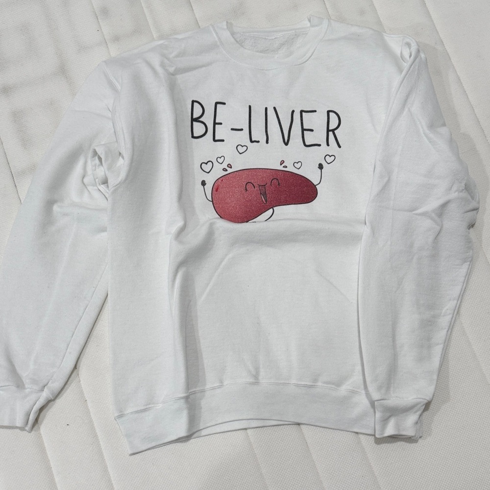 White Be-Liver Graphic Sweatshirt